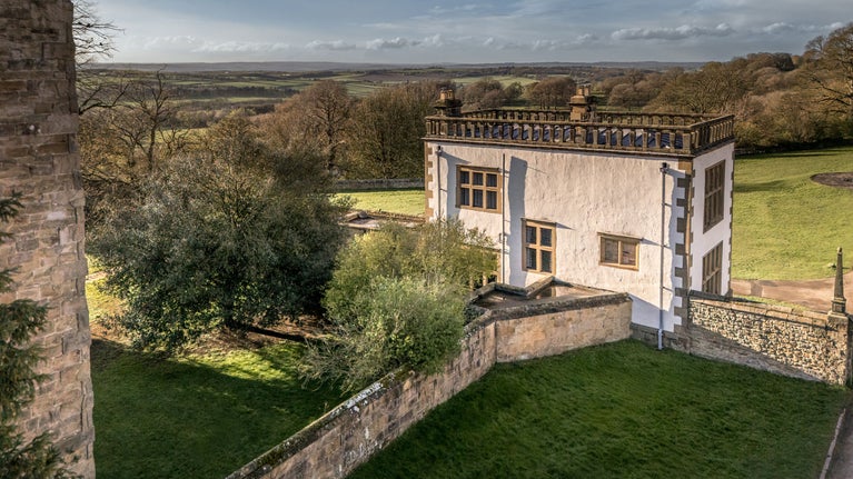 An aerial view of Hardwick East Lodge and the countryside beyond, Derbyshire